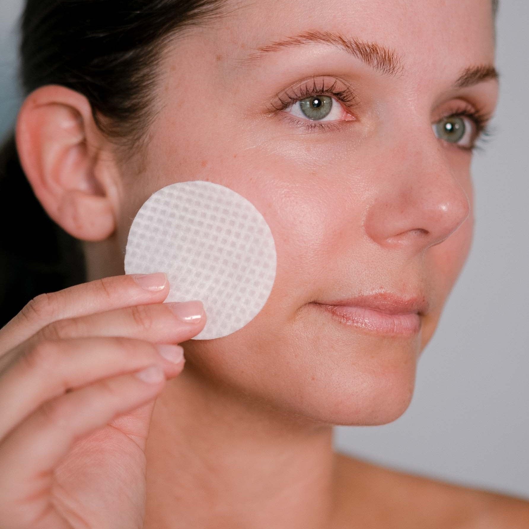 Model using Power Wash Peel Pads - glycolic acid exfoliation